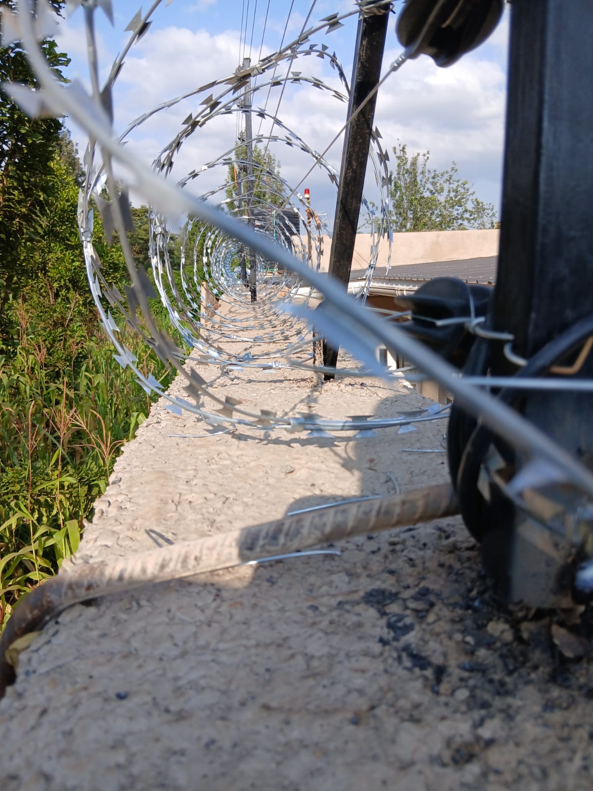 Top-Wall Electric Fence — Private Residence